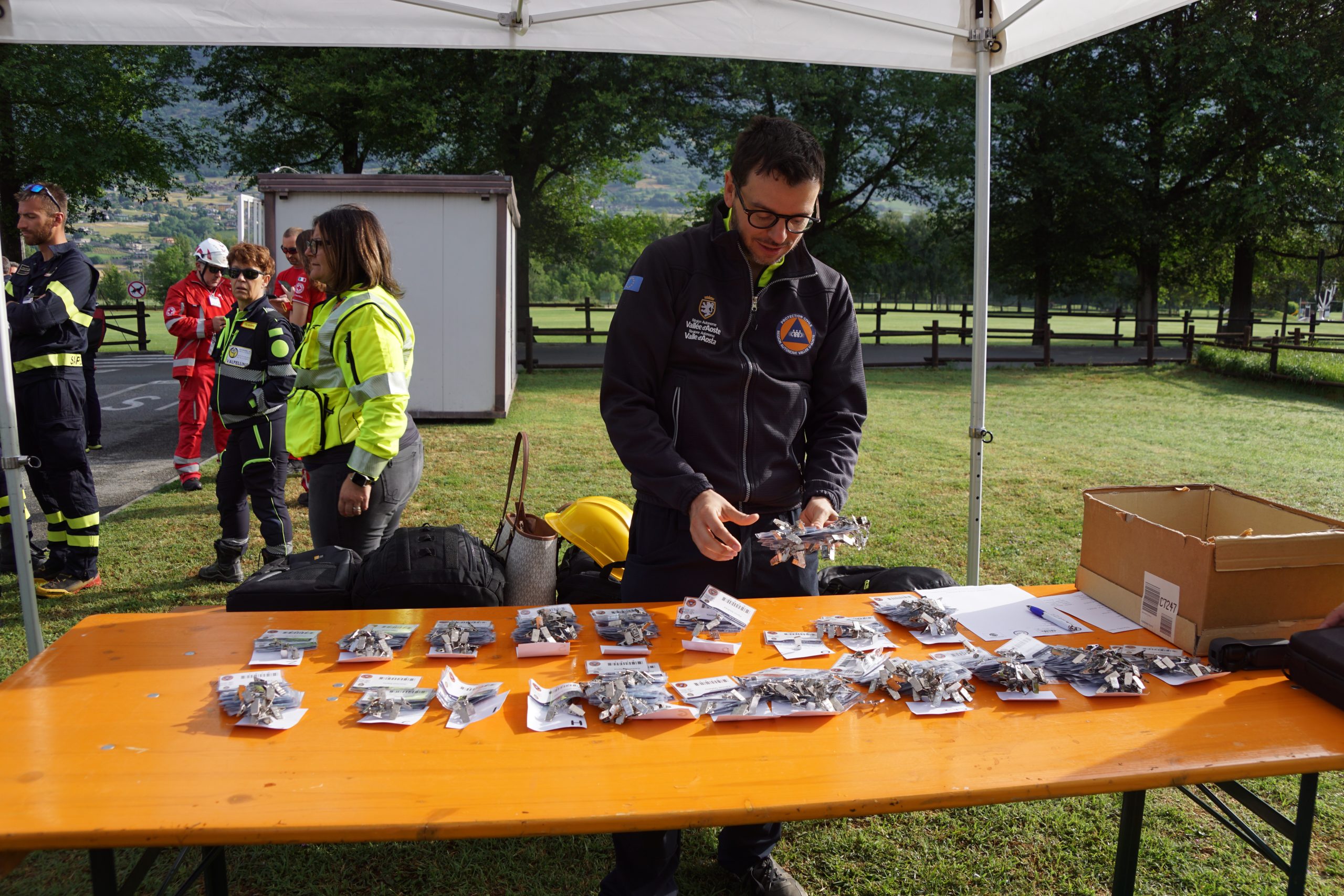 Punto di ritiro dei badge per i partecipanti