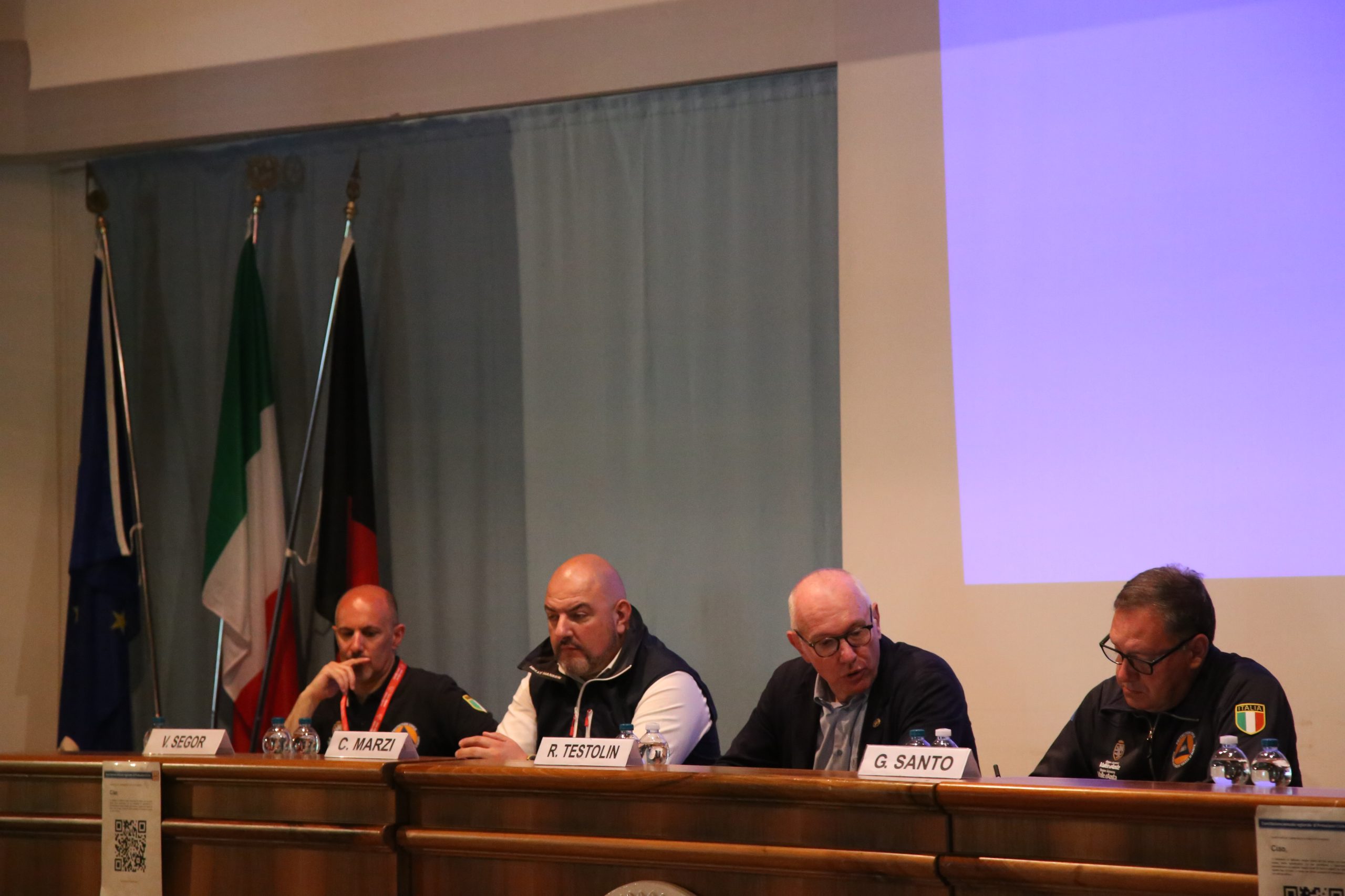 Valerio Segor, Carlo Marzi, Renzo Testolin e Giovanni Santo introducono i lavori al seminario 